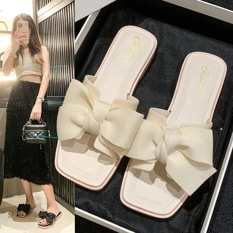 Fashionable Butterfly Knot Flat Bottom Slippers Women's Summer Outdoor Wear Soft Bottom Home Slippers Versatile Fairy Wind Cool